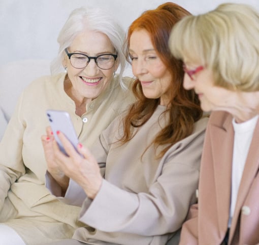 three women videochatting on mobile